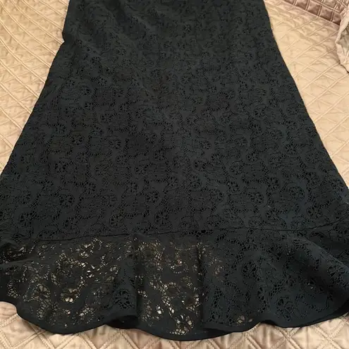 Kay Unger  long black lace skirt with ruffle and front slit size 12