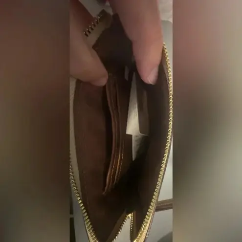 Coach  Corner women’s Zip Wristlet Signature Canvas Stripe khaki‎ chalk saddle