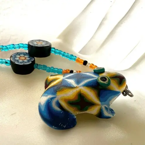 Beaded blue frog pendant necklace