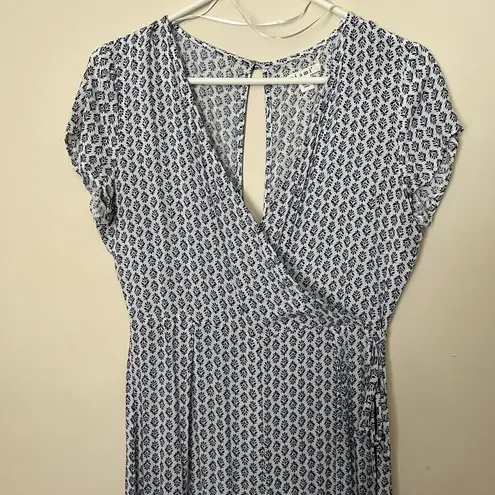 Francesca's Francesca’s Blue And White Floral Jumpsuit Size Small