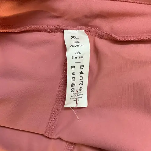 Halara 2-in-1 mini golf skirt with high waist, drawstring, side pocket and rounded hem