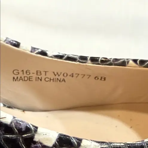 Cole Haan Grand.OS Snakeskin Leather Heels
Size 6 | Black White Python Print