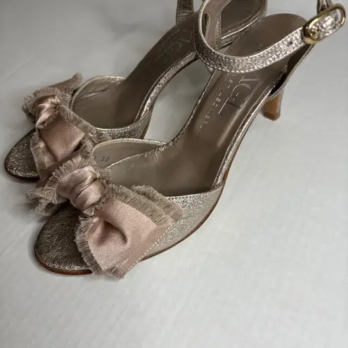 AGL Attilio Giusti Leombruni Women's Metallic Bow Ankle Strap Heels Size 38 Gold