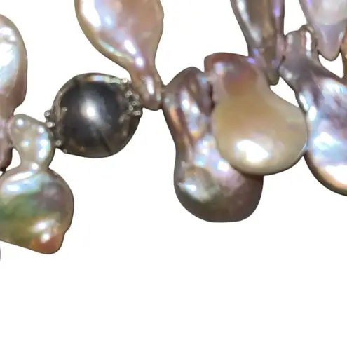 Keshi pearl & sacred OM mandala w/ unique charms along the string of pearls