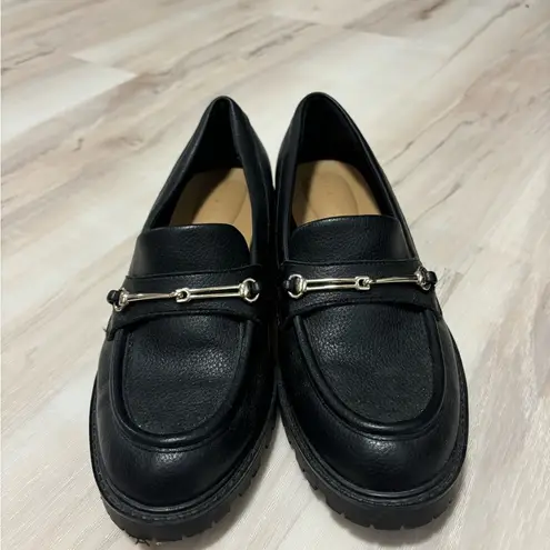 Kelly & Katie Black Leather Flats with Sleek Design