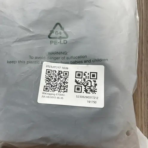 Halara Everyday High Waisted Side Pocket 7/8 Leggings in Black Size XS NWT