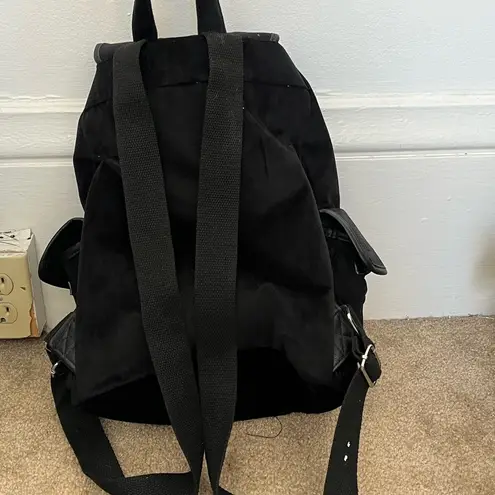 Women’s soft crushed black velvet faux leather snap button sling backpack