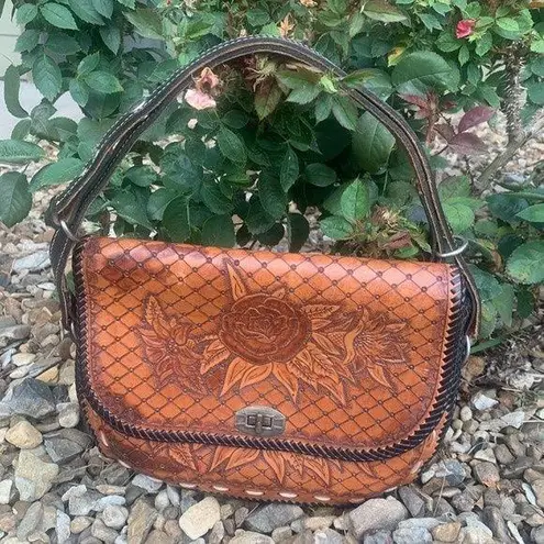Vintage hand tooled leather turn lock purse