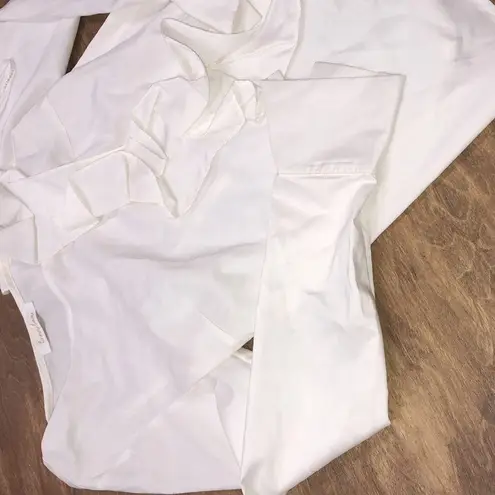 Foxiedox Luna Luna size small ivory top with ruffles