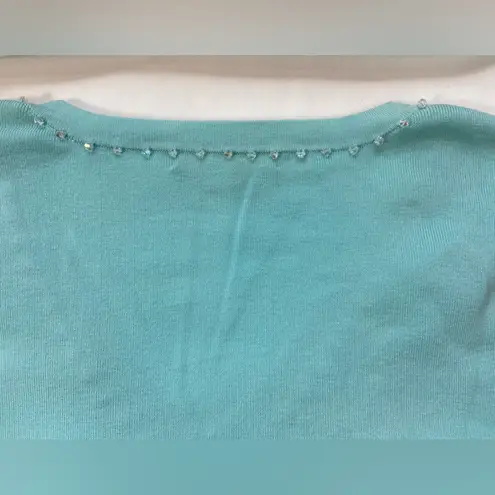 Piccolo Bella, V neck knit top
With embellishments along the neckline size L Blue Size L