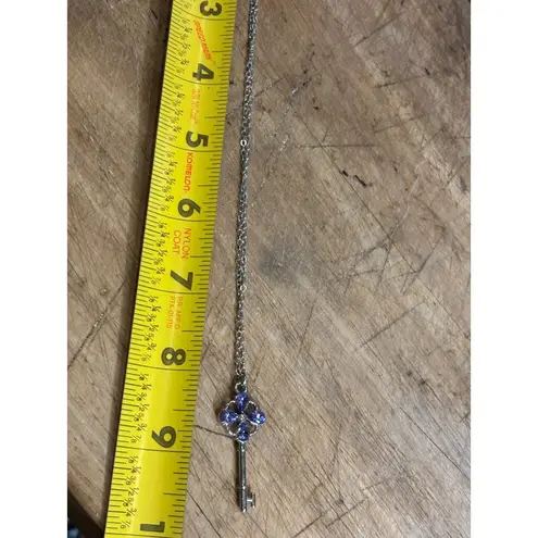Silver Key Pendant Necklace With Purple Gemstone Accents & Chain