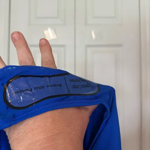 Juicy Couture  Vibrant Blue Swimsuit with Colorful Accents