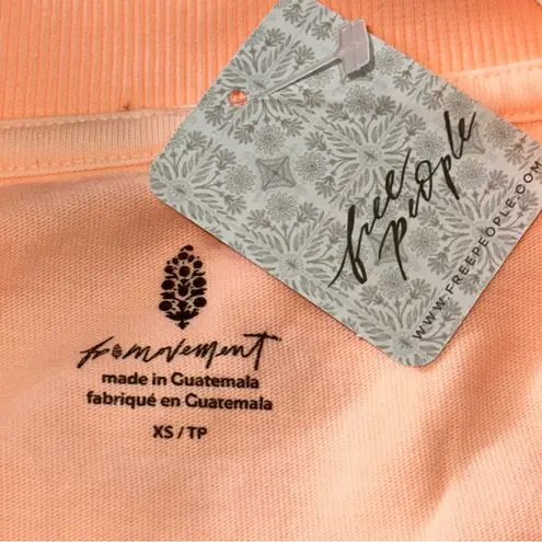 Free People FP Movement XS Cantaloupe Orange Logo Tackle Oversize Cotton T