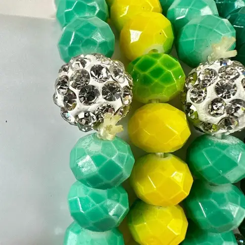 Amrita Singh green and yellow stretchy bracelet bundle