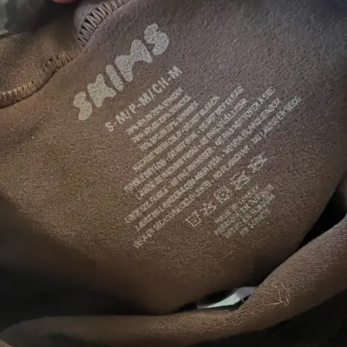 SKIMS Solution Short Exposed Shape wear in Cocoa Size S-M