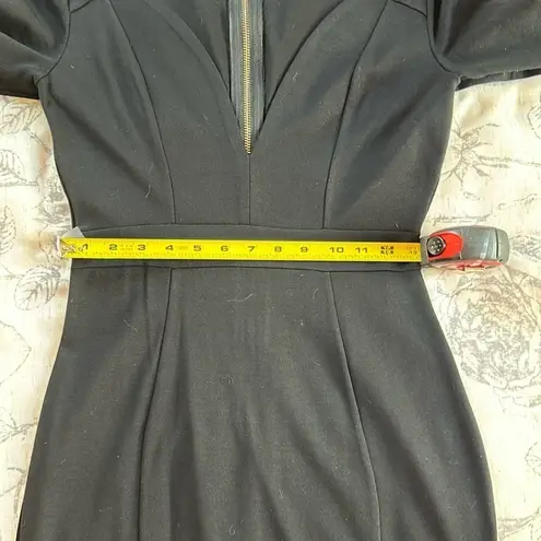 Privy edgy, sexy vampire Black tight mini dress with plunging neckline NWT MD villain