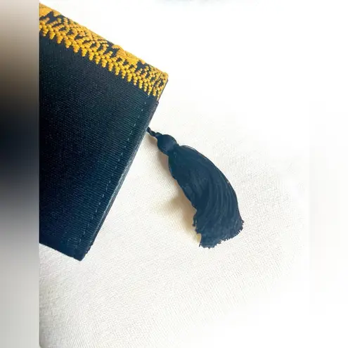 Tribal print and black small clutch black with tassel on the zipper snap closure