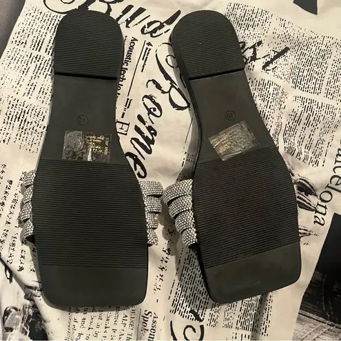 Stylish Black and Silver Sandals Size 10