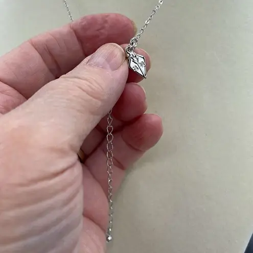 A.U. Ribbon and Hope Rhodium plated CZ necklace. Silver