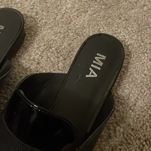 MIA  Porsha black patent mules size 6