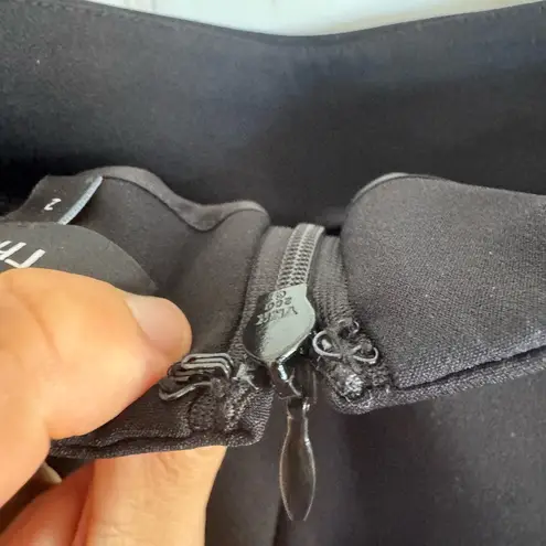 Theory  black skinny pencil skirt perform tech size 2