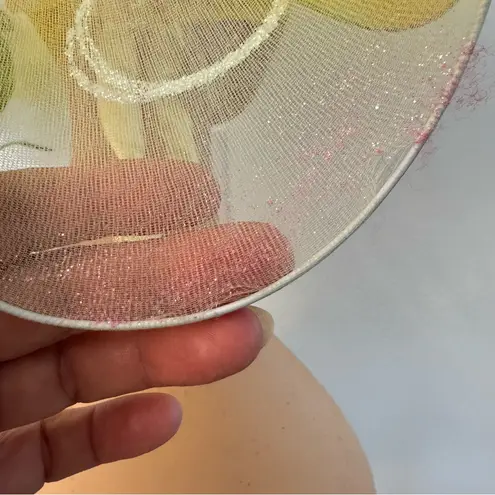 Handmade yellow floral hat. This hat was made for the stage in the theater.