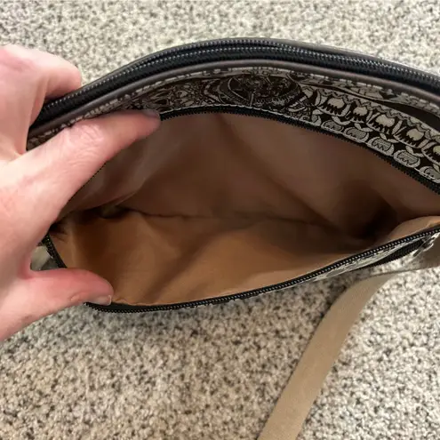 Sakroots  Crossbody Peace Bag Purse Coated Vinyl Black Tan Zip Pockets