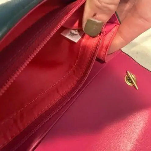 MCM Visetos Mina Crossbody Bag Dark Grey with a Pink Bow Accent