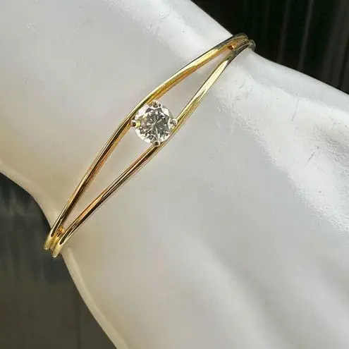 Gold tone open cuff rhinestone bracelet