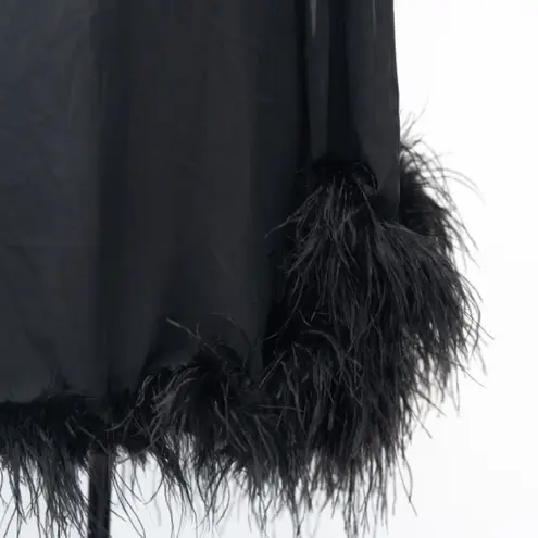 Betsy and Adam . Feather Trim Single Long Sleeve Cocktail Dress.