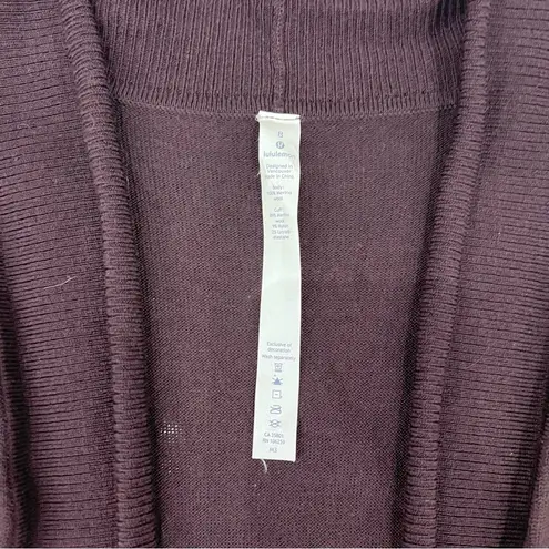 Lululemon  Sit In Lotus Wrap II
Black Cherry Cardigan