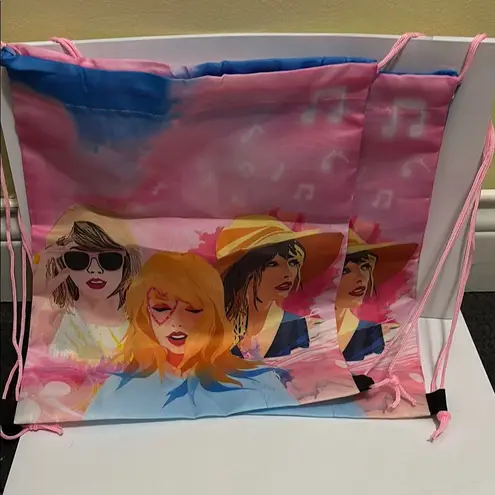 Taylor Swift Pink and Blue Backpack with Artistic Design ( each) - Image 1
