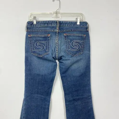 Bebe  EWomens Dark Wash Blue Denim Bootcut Low Rise Pants size 28 FLAWED