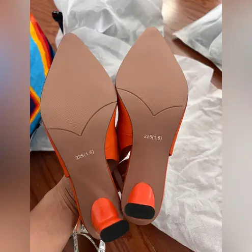 Orange Slingback Heels
New high