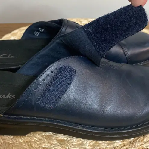 Clarks  womens leather navy blue slip ons size 27