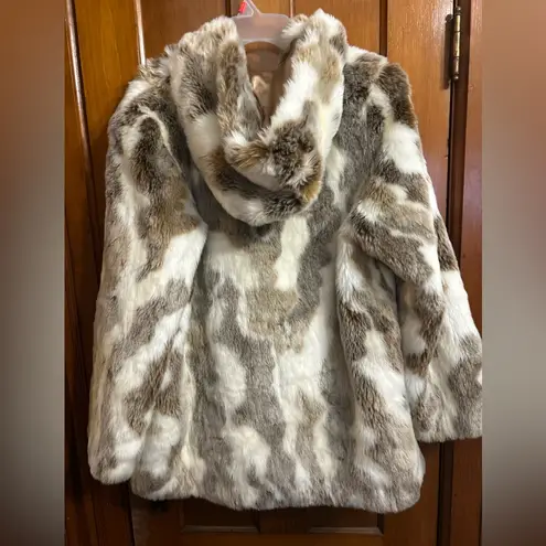 East 5th Faux Fur Medium Length Coat
Brown & White, Different Shades of Brown