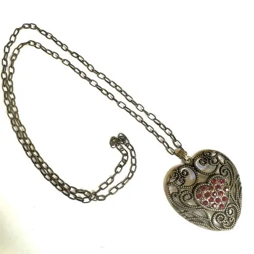 Brass tone red rhinestone heart pendant necklace