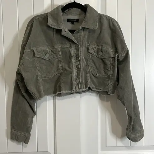 Black Label  corduroy cropped jacket green. S. Model used to showcase style.