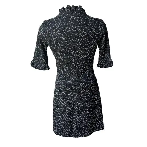 NWT, Andria Lieu Collection Horseshoe Neck with Ruffle Trim Neck and Sle… Black