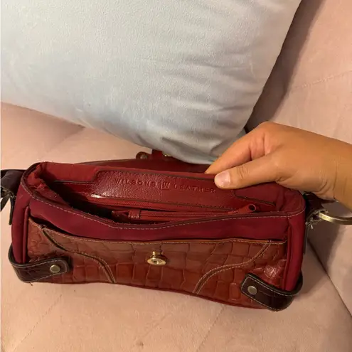 vintage wilson’s leather red y2k shoulder bag with buckle detail