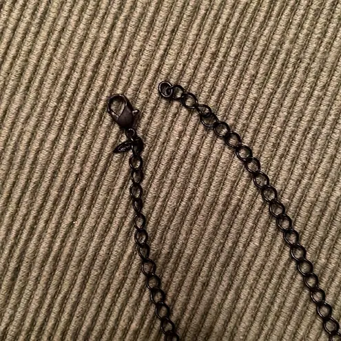 3 necklaces in black, black and gold, black and white colored EUC