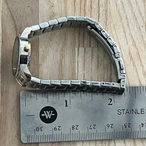 Caravelle by Bulova Ladies Watch Diamonds Black Dial Two Tone Bracelet