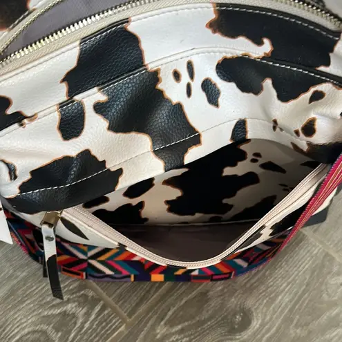 Faux leather fun Cow Print Backpack with colorful strap