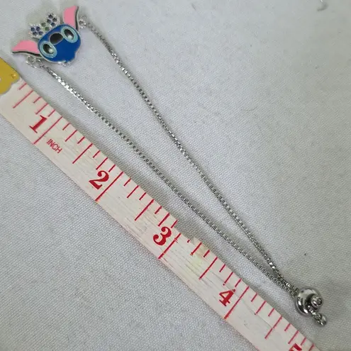 Silver Stainless Steel Bolo Adjustable Pull Bracelet with Stitch Charm Blue