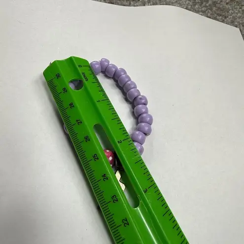 Assorted Stretch Bracelets 3 Piece Shades of Purple Dangle Charms Cross Crown