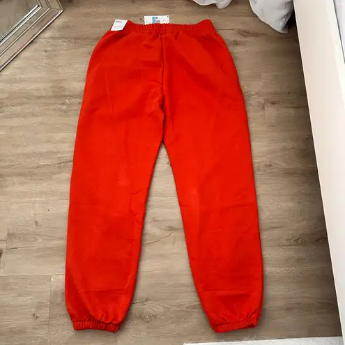 Nike swoosh red/orange sweatpants