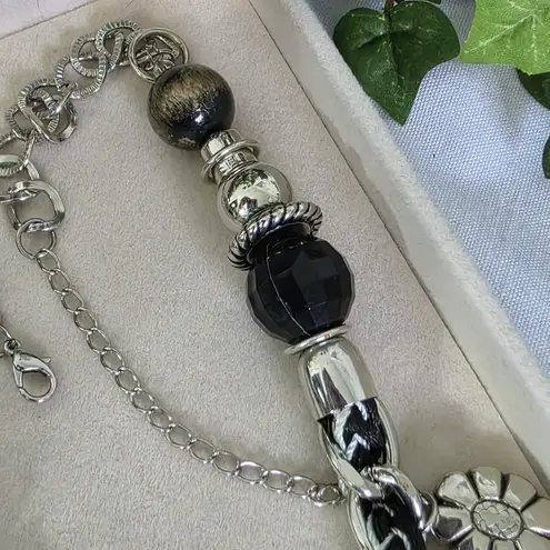 Silver and Black Charm Necklace Mixed Media
