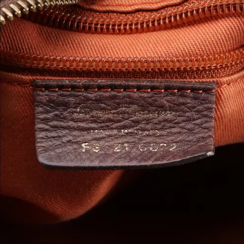 Salvatore Ferragamo TAN & BROWN DISTRESSED EMBOSSED LEATHER W/GANCINI FRINGE