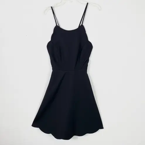 Lulus Lulu’s Play On Curves Black Scalloped Hem Backless Mini Dress