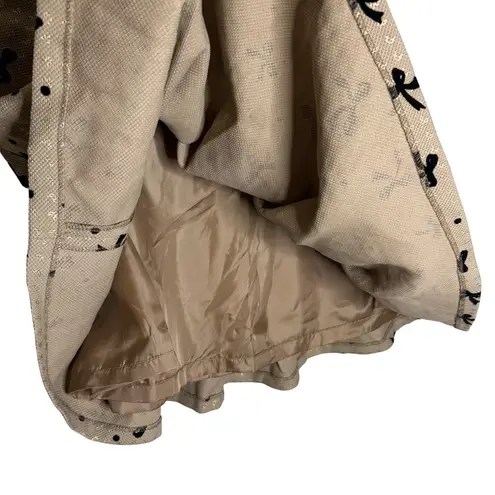 Ruby NWT Tan Pleated Skirt with Velvet Bow Print